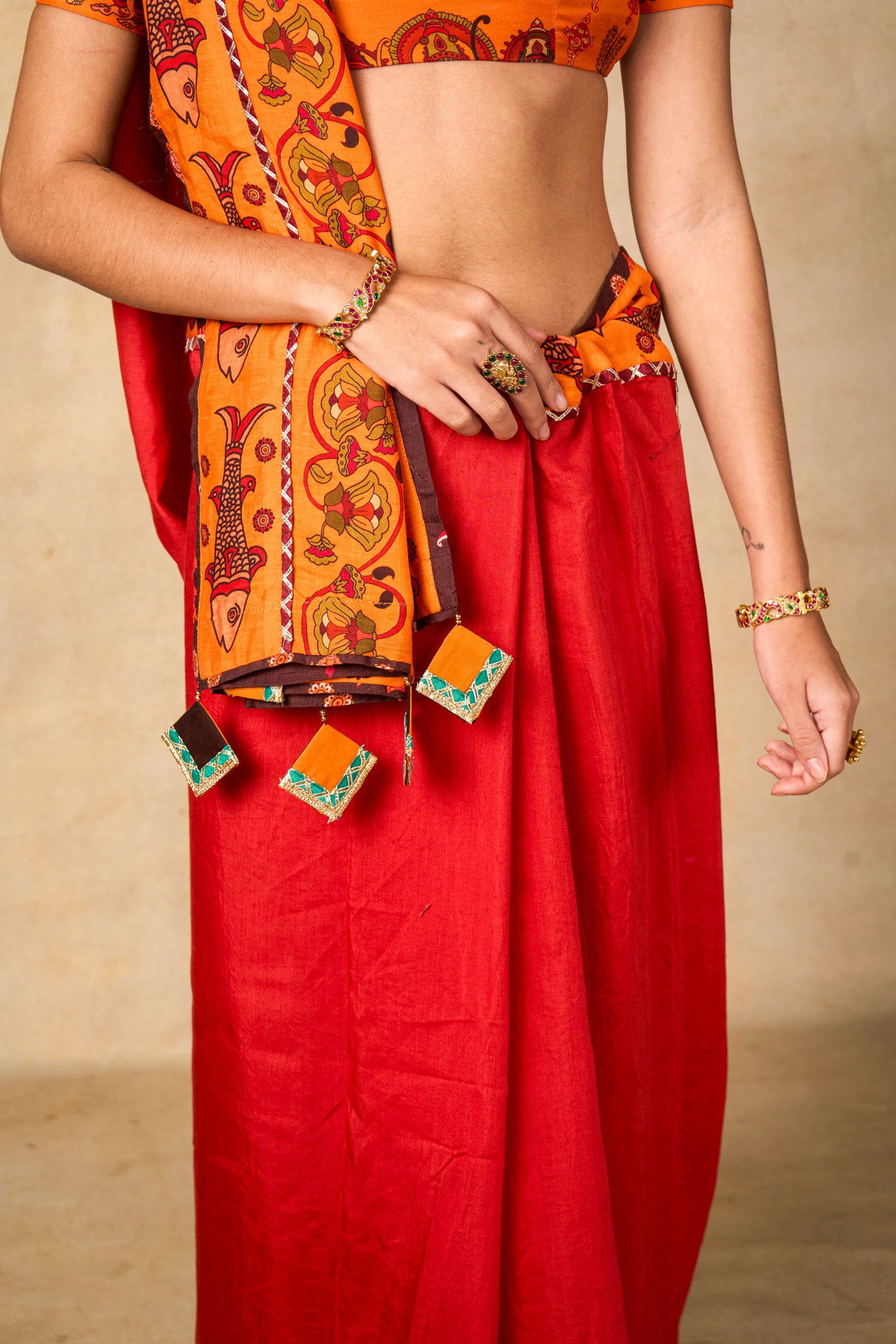 Siya Sutra red saree