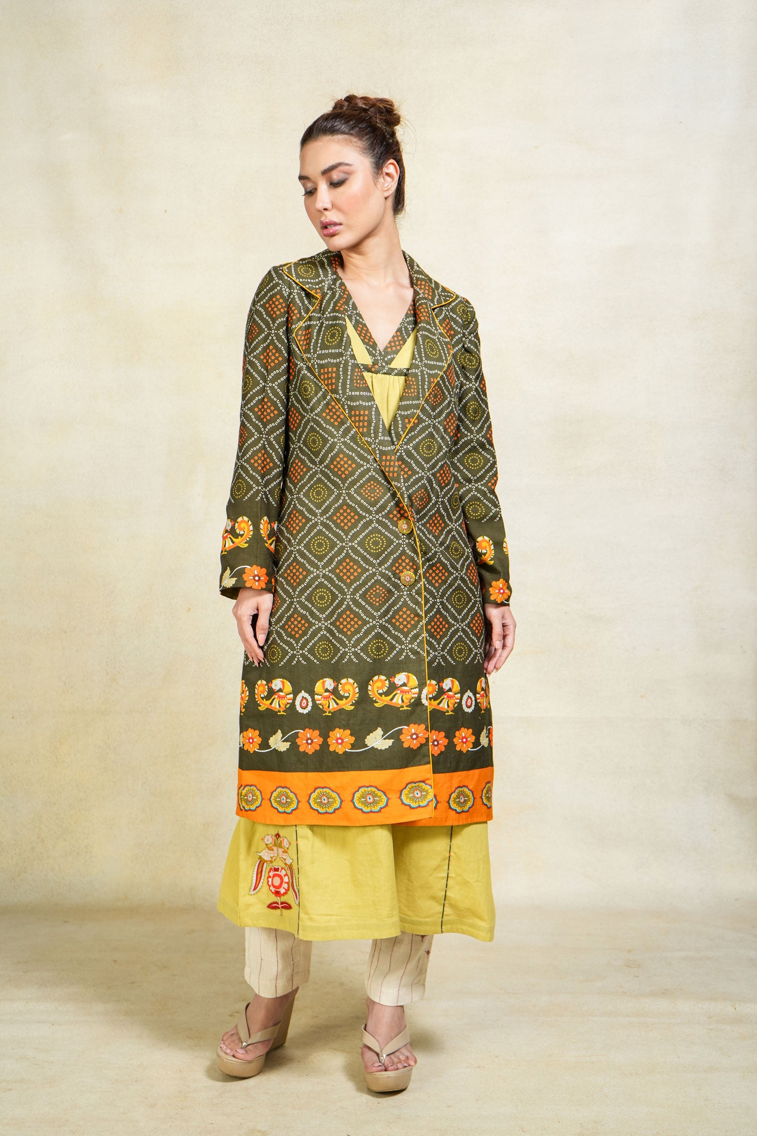 Haridra green trench coat