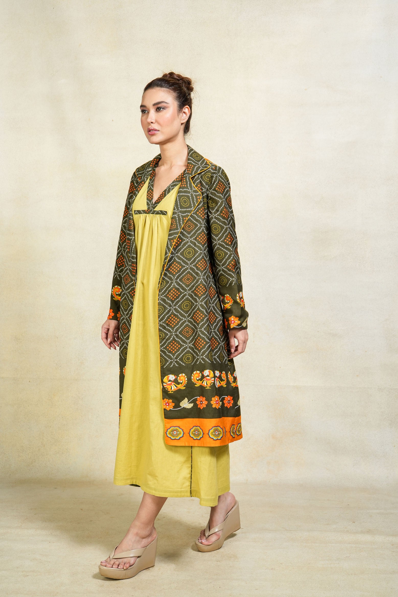 Haridra green trench coat
