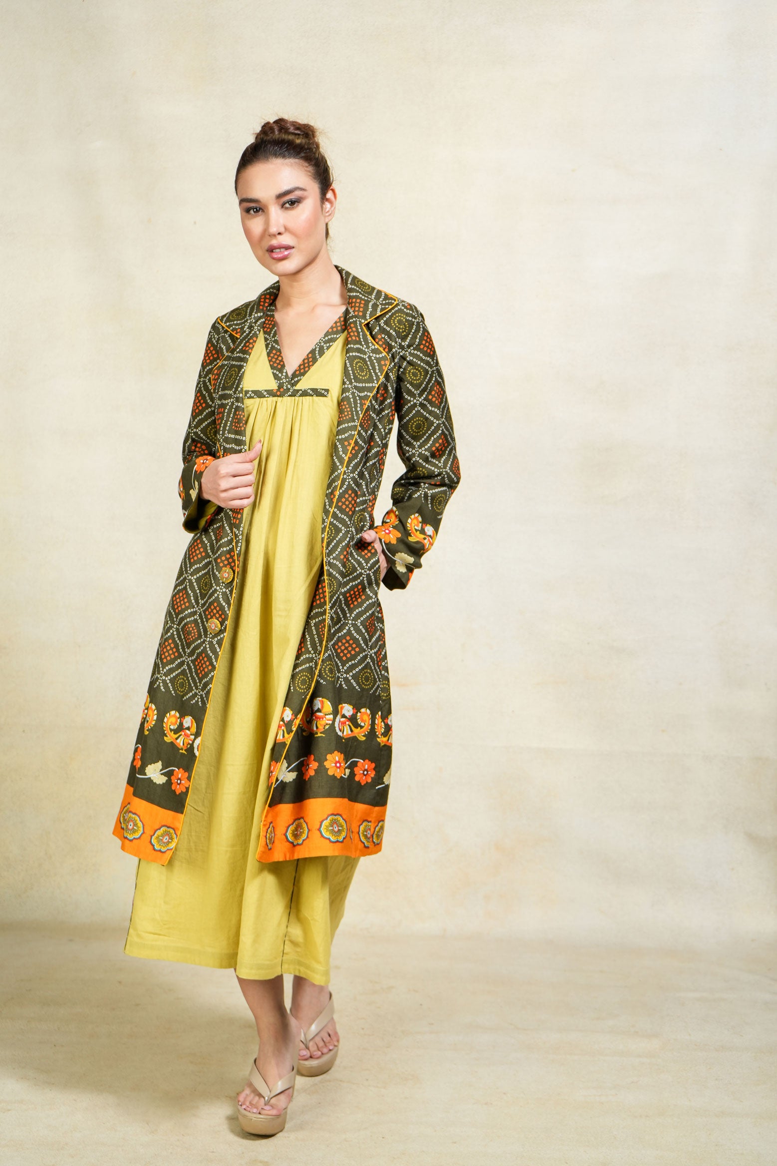 Haridra green trench coat